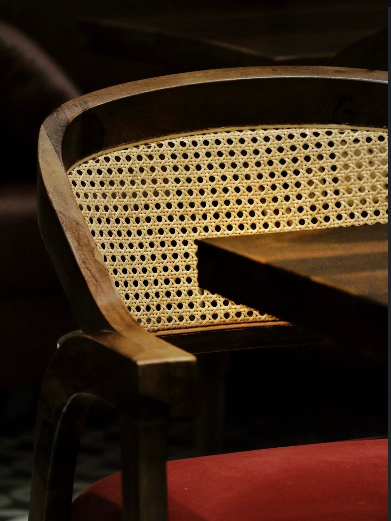 Cane and timber cafe chair detail at Onefold
