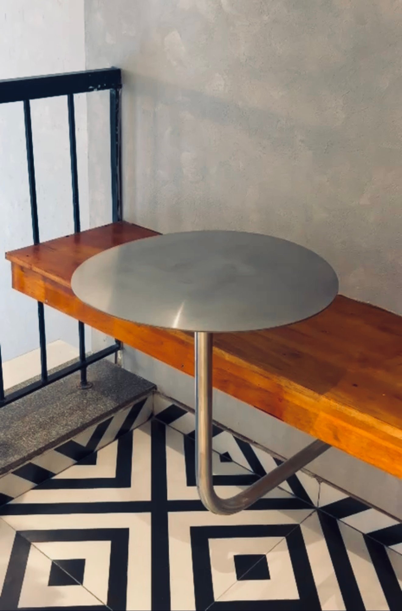 Wall fitting stainless steel cafe table supplied by DYKU